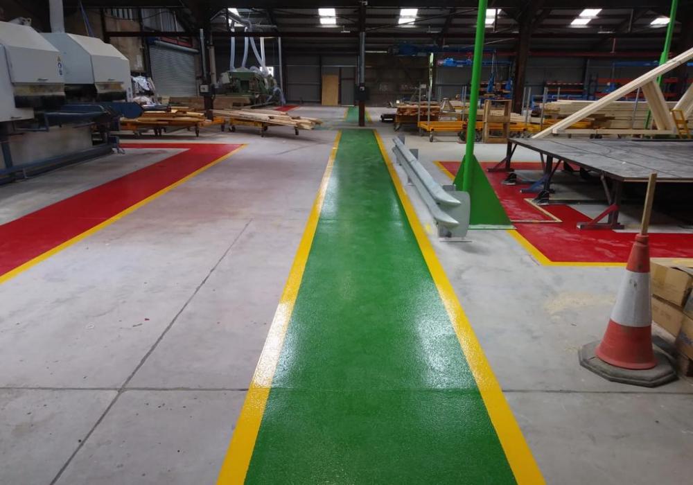 Demarcation resin floor