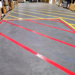 Demarcation resin floor