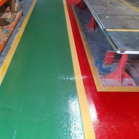 Demarcation resin floor