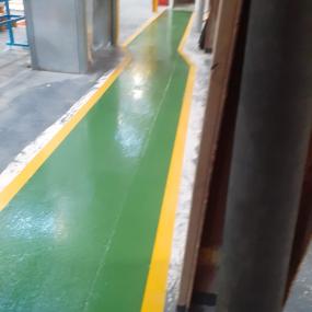 Demarcation resin floor