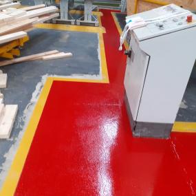 Demarcation resin floor