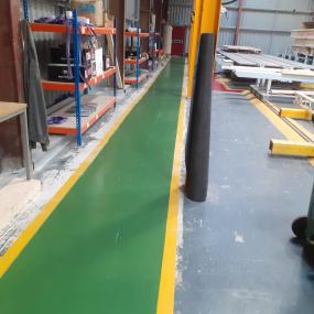 Demarcation resin floor